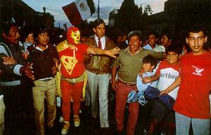 Corpulent caped crusader: Super Barrio at work in Mexico City.
